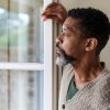 middle aged black man gazing out windowGettyImages 1171712738 16x9 1