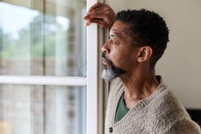 middle aged black man gazing out windowGettyImages 1171712738 16x9 1