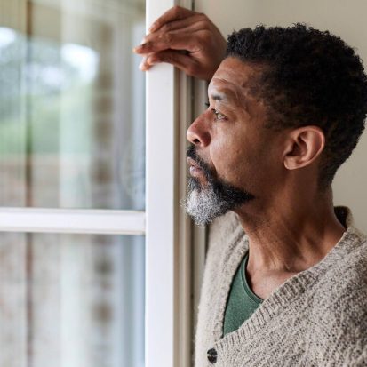 middle aged black man gazing out windowGettyImages 1171712738 16x9 1