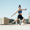 soccer player woman and soccer ball kick in fitness 76047129 Large