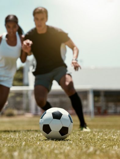 friends soccer player and soccer training game on football 76046845 Large